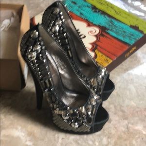 Black, silver studded pumps
